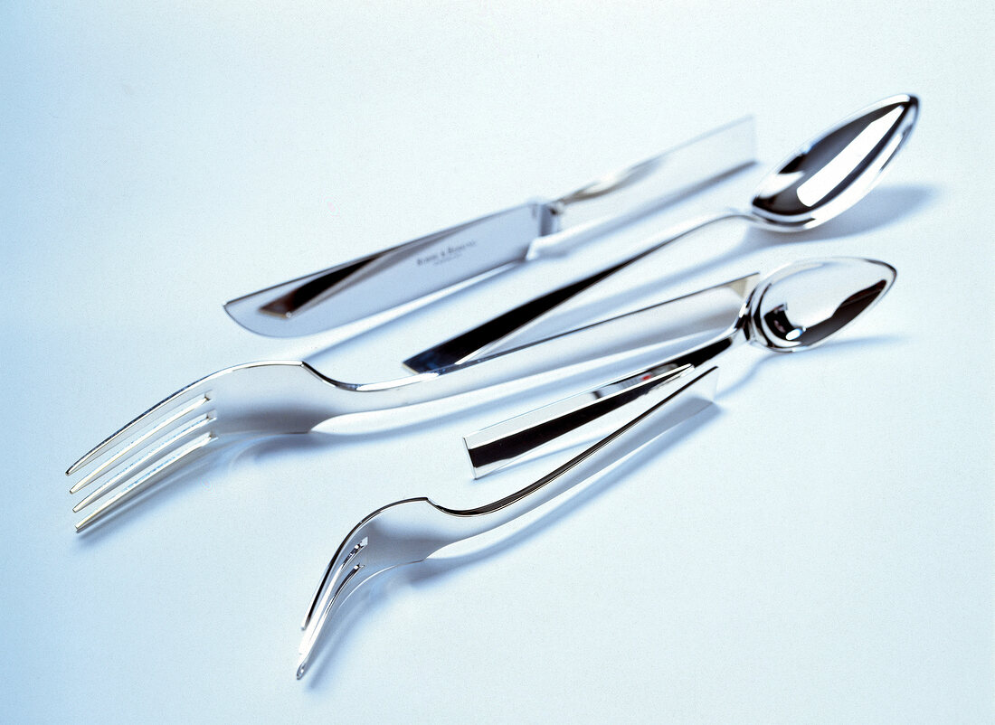 Stainless steel cutlery on white background