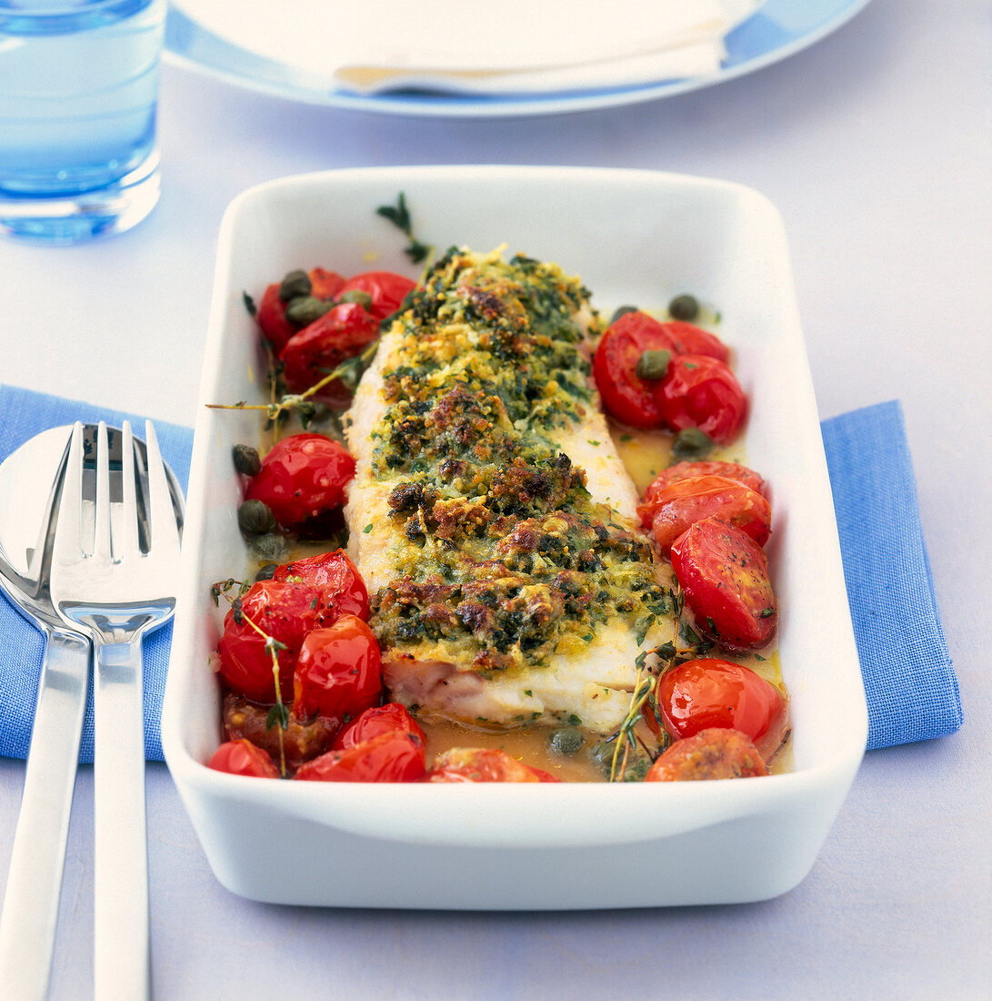 Cod fillet with herb crust served in rectangle bowl