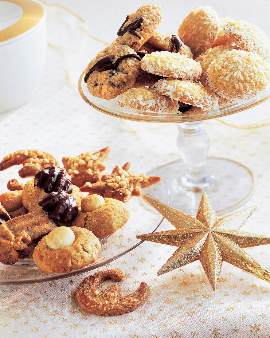 Various wholemeal and star shaped cookies on glass plate