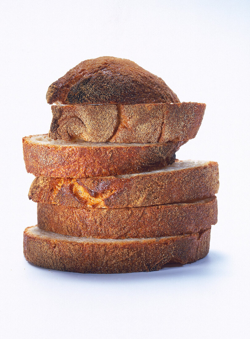 Close-up of slices of ciabatta white bread on white background