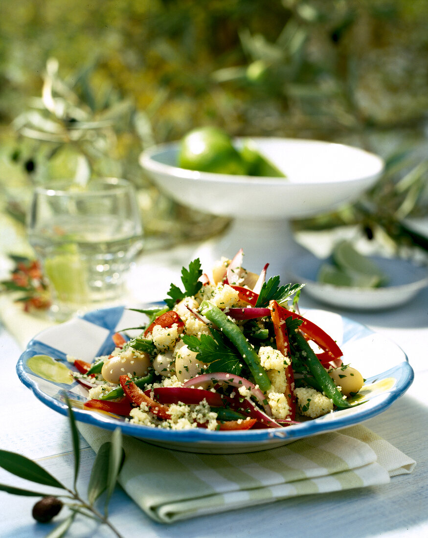 Bean couscous salad on white plate