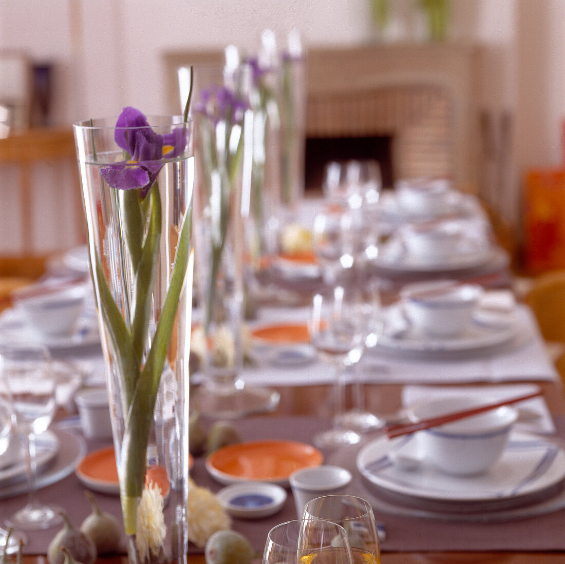 Big glasses with flower in middle of table