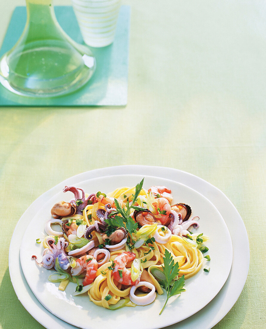 Tagliatelle with seafood on plate