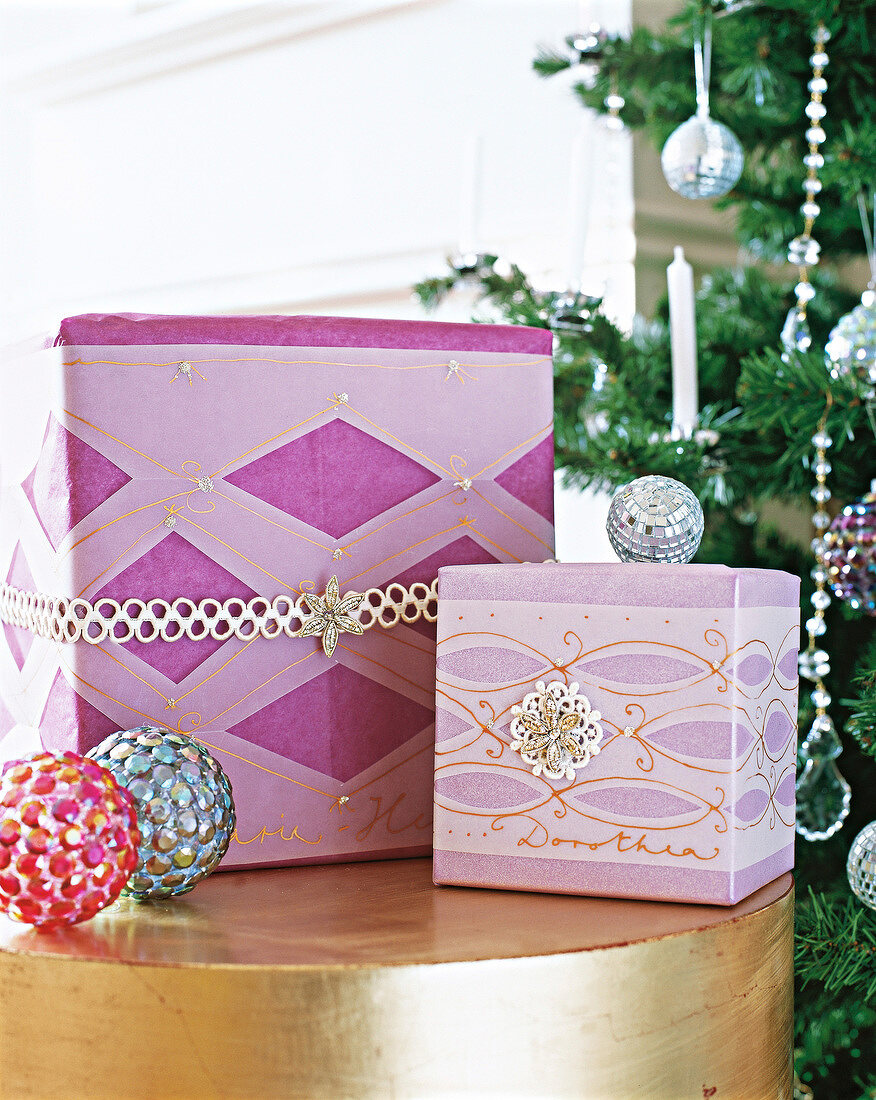 Gift wrapped purple and pink tissue paper box, Christmas