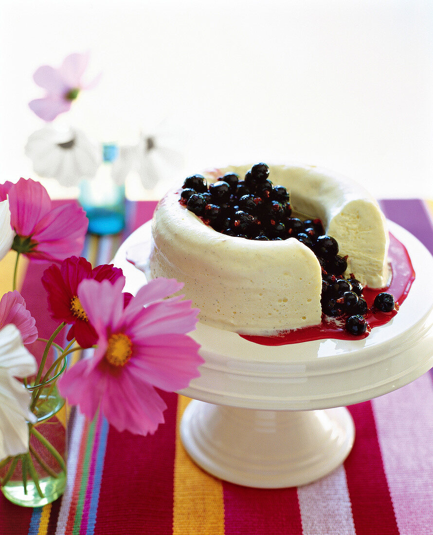 Vanilla parfait with blackcurrant on cake stand