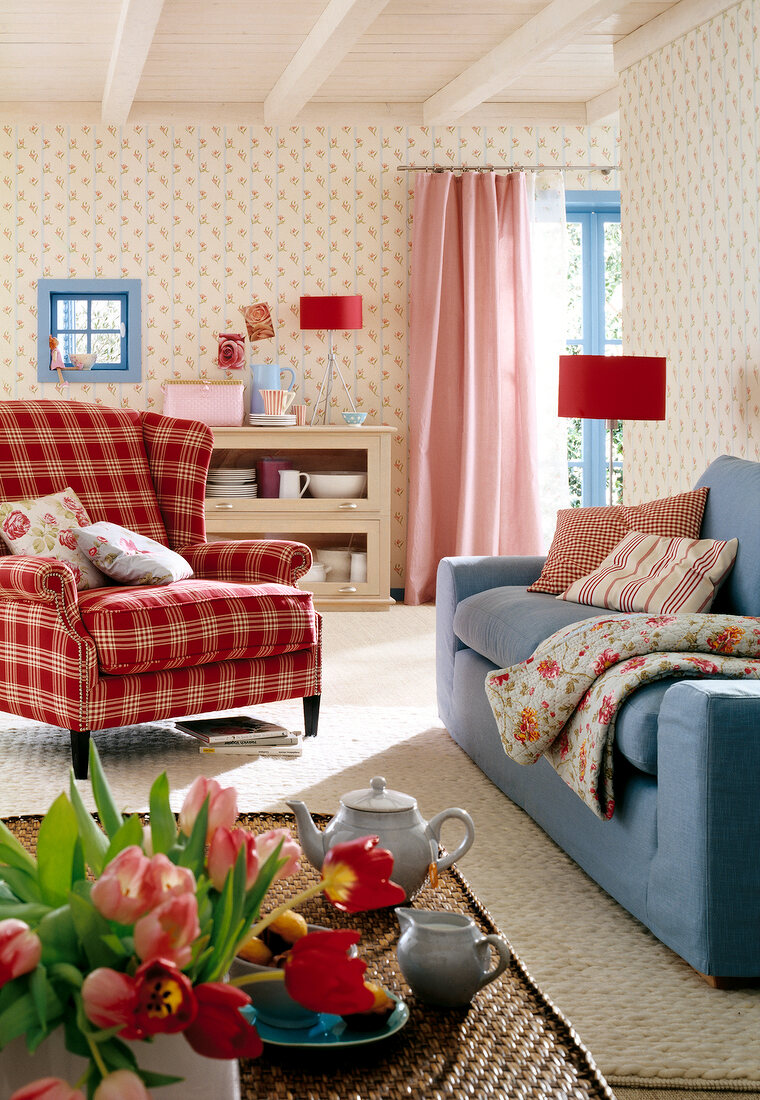 Cosy living room with floral pattern wallpaper