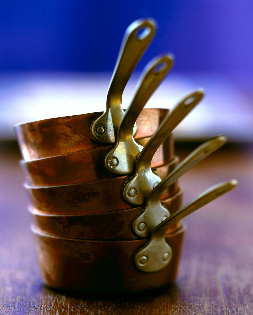 Close-up of stack of several pans