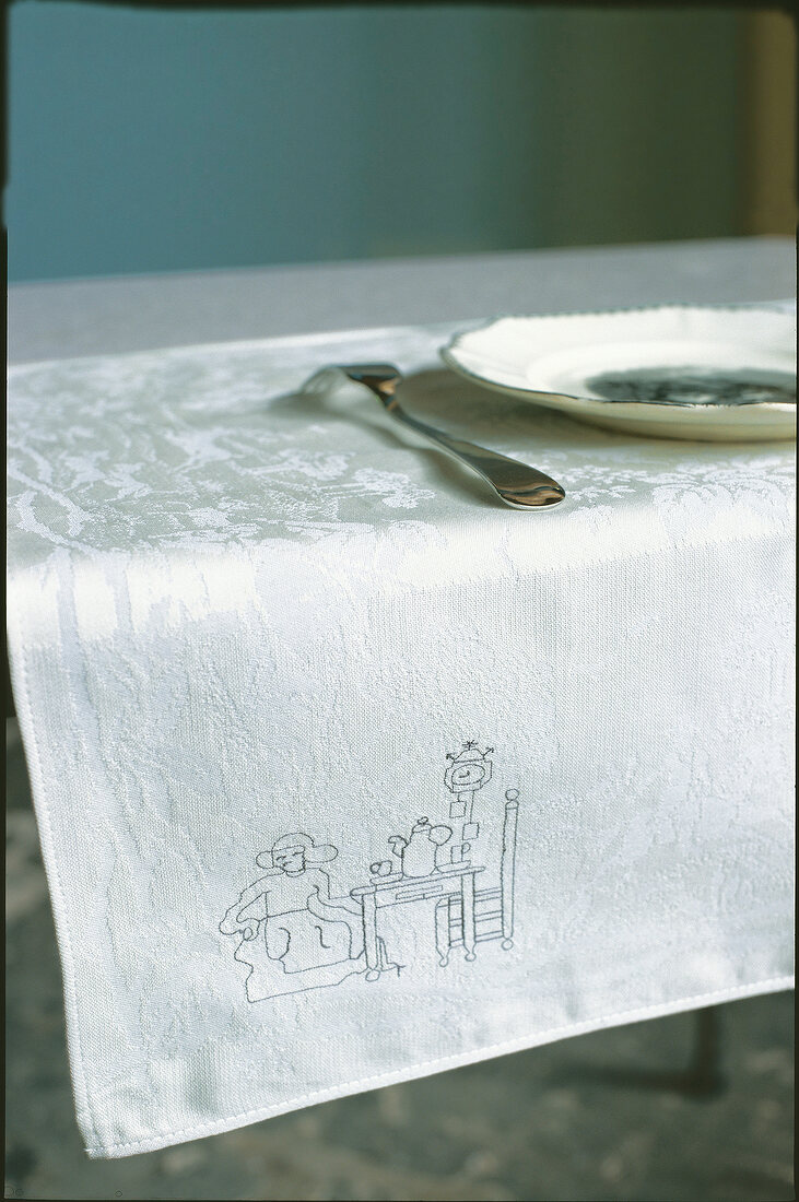 White table cloth with drawing designed by Jurgen Bey