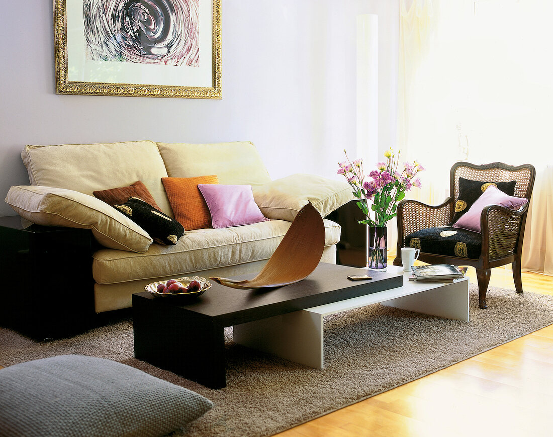 Living room with sofa, armchair and side table