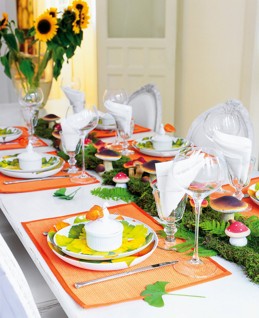 Autumnal table laid with decorations