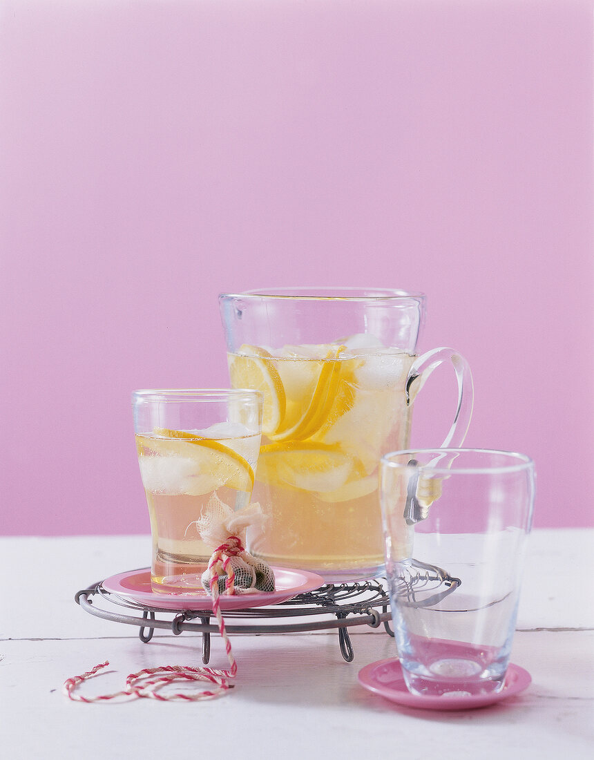 Woodruff lemonade with blossom honey on table