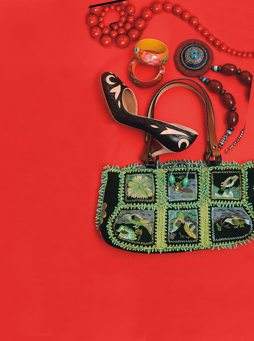 Various Mexican accessories on red background