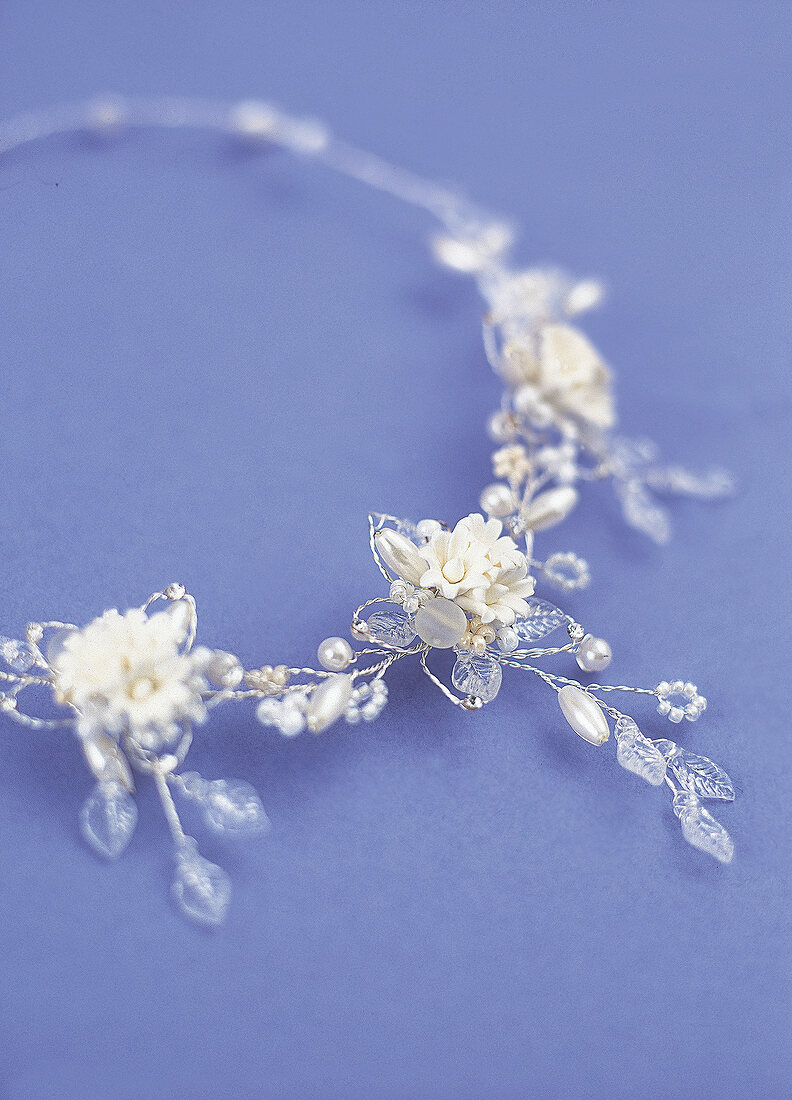 Close-up of flower braid on purple background