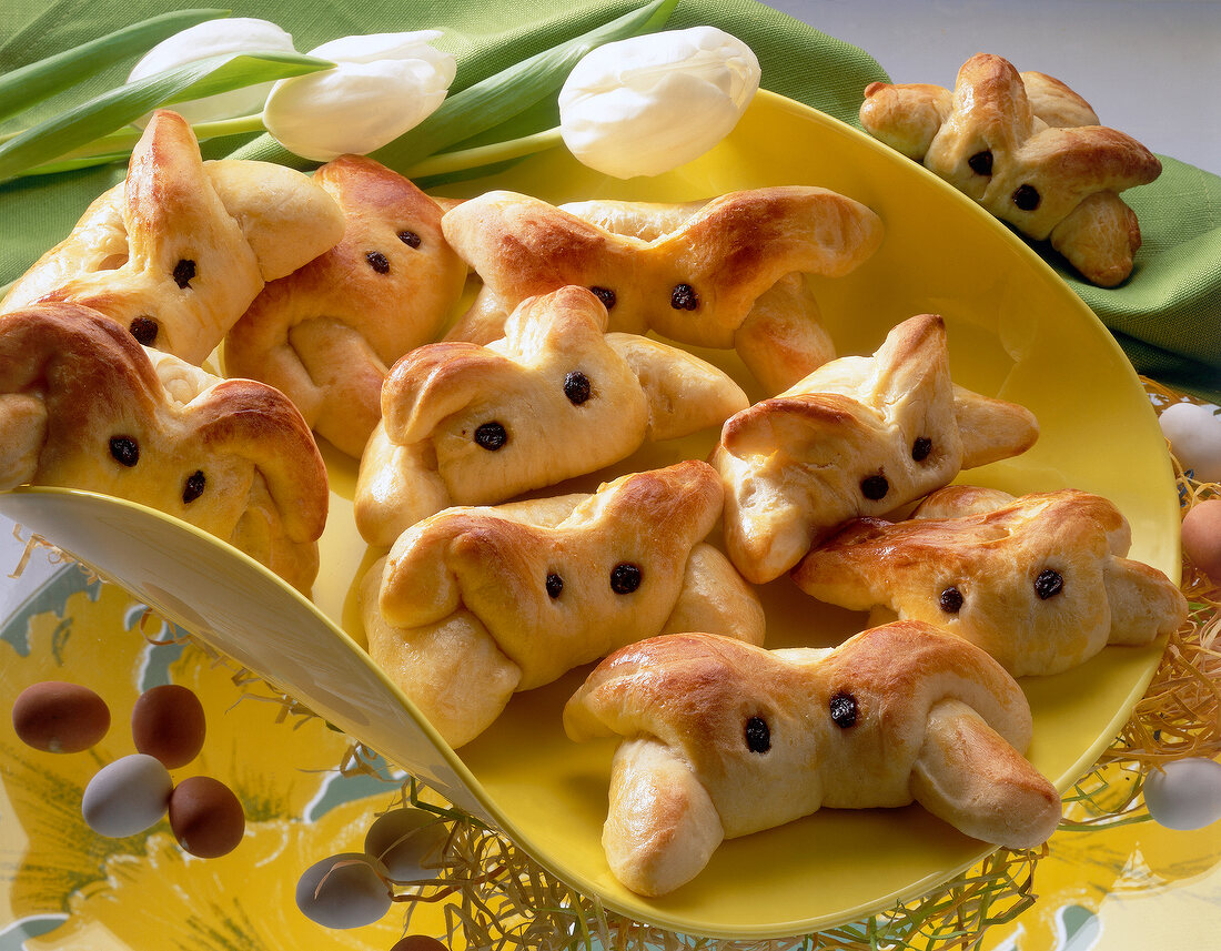 Crispy rolls with funny shaped small rabbits on fancy plate