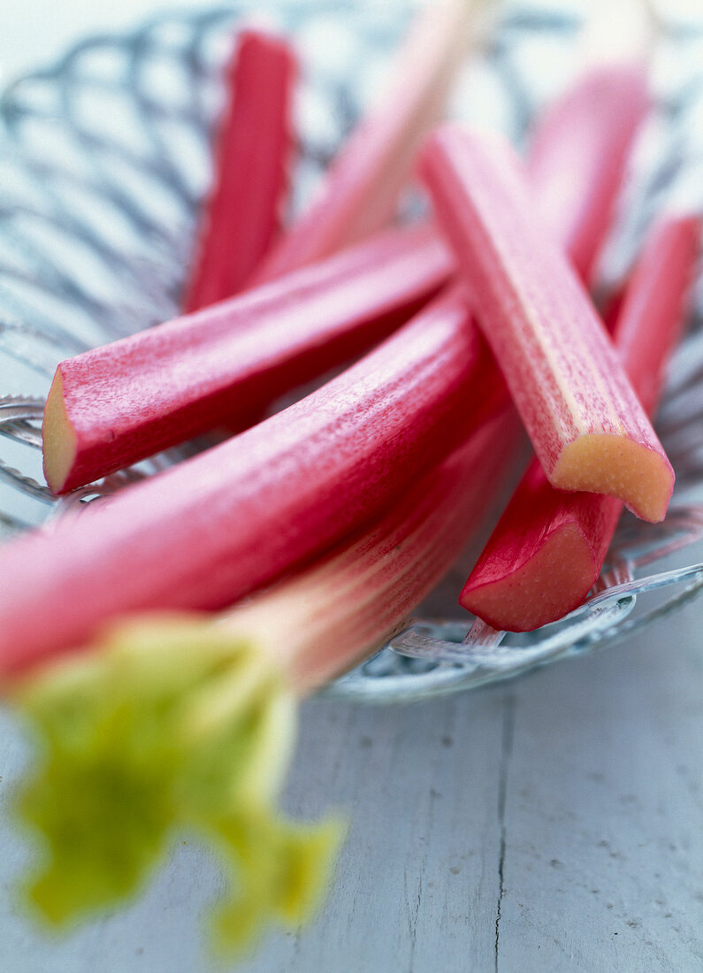 Close-up of sticks of rhubarb on napkin