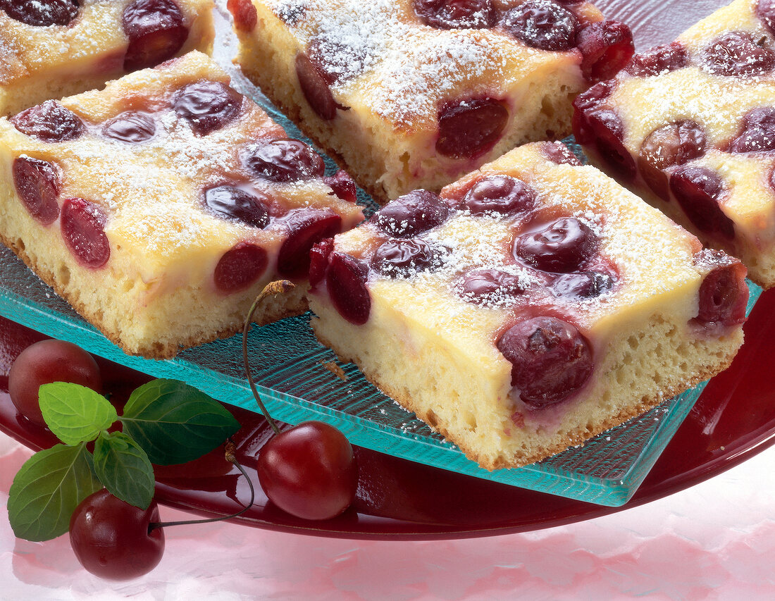 Pieces of cherry cakes on plate