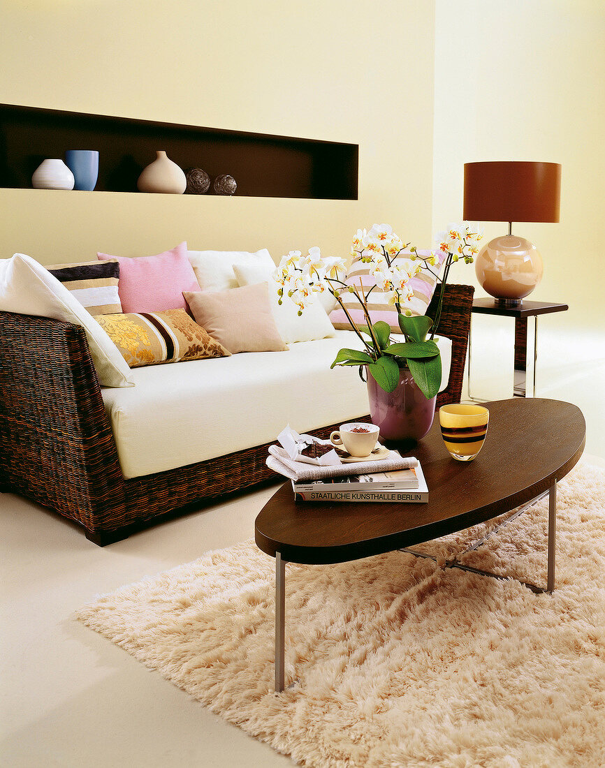 Living room with brown and light shade furniture and interiors