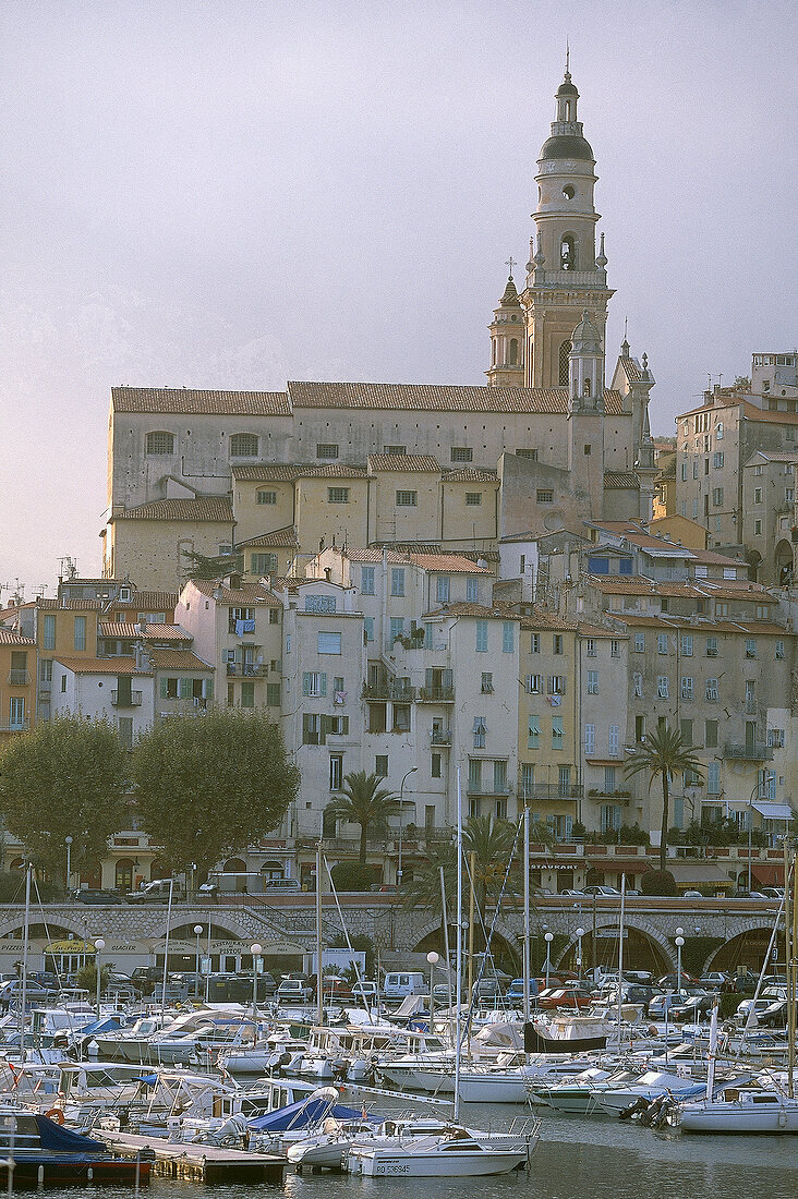 White church with yachts in harbour, Old Town of Menton