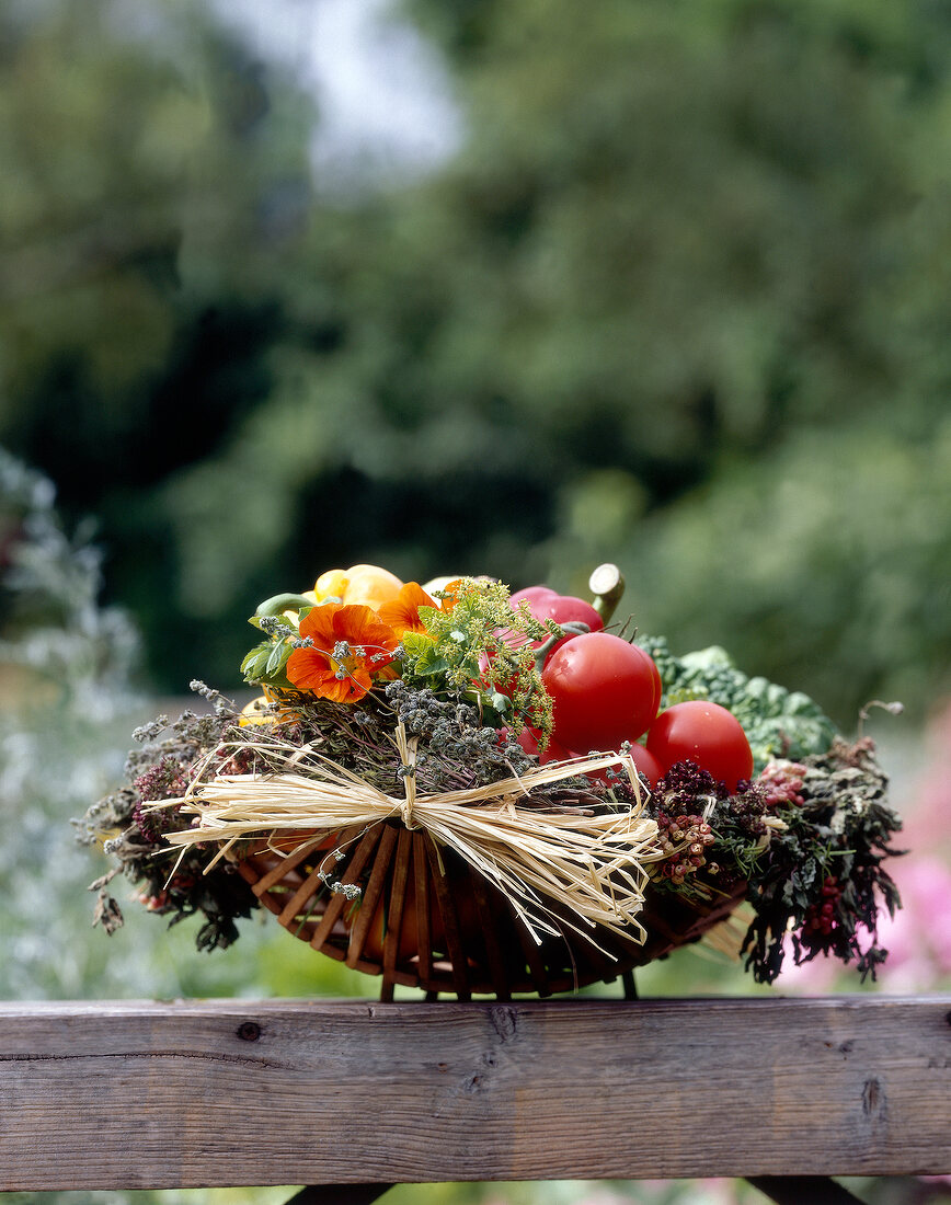 Variety of herbs and vegetables in basket