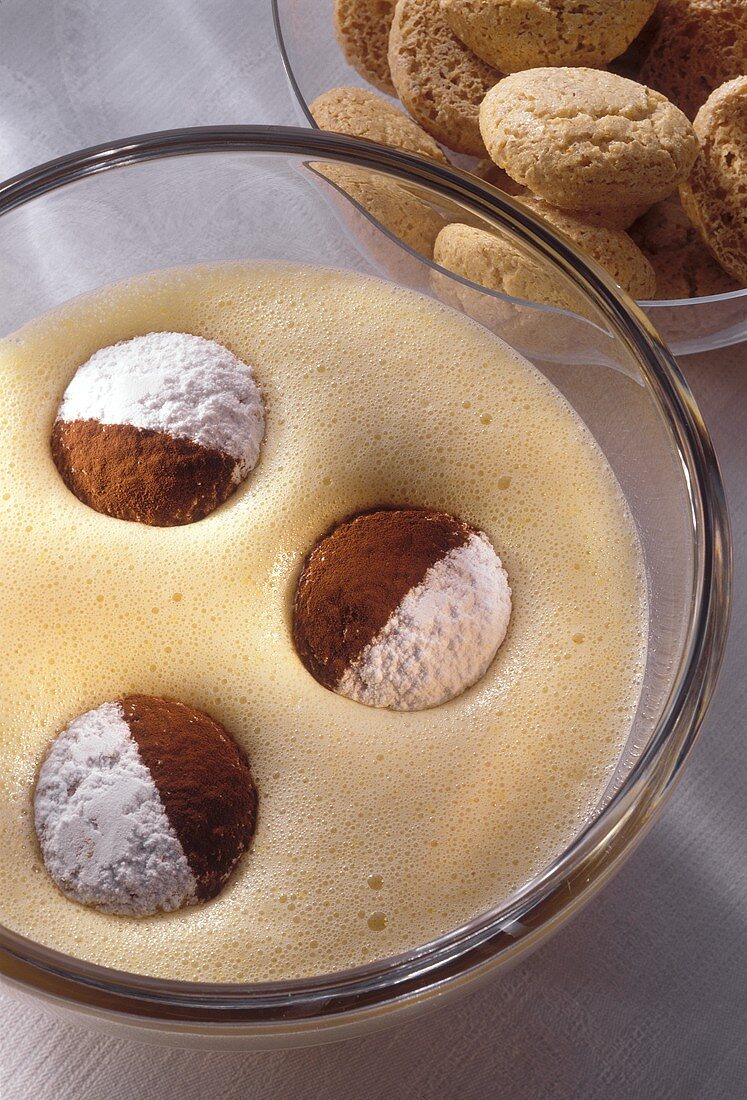 Zabaione (whipped wine cream with amaretti), Sicily, Italy