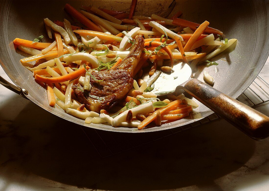 Lamb Chop on Vegetables in a Wok