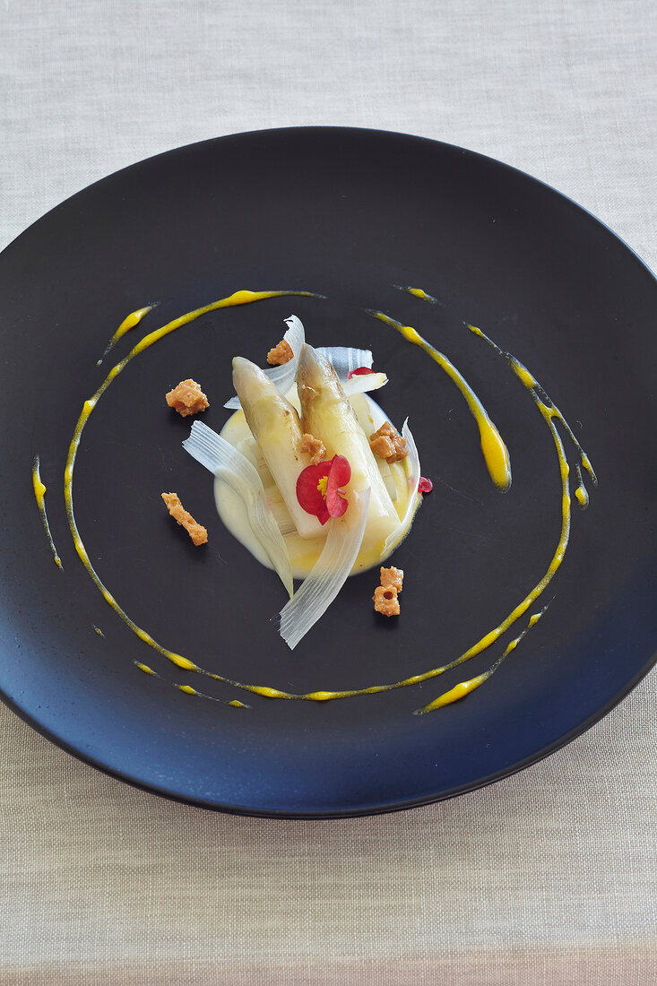 White asparagus in a pool of sauce (Galicia, Spain)