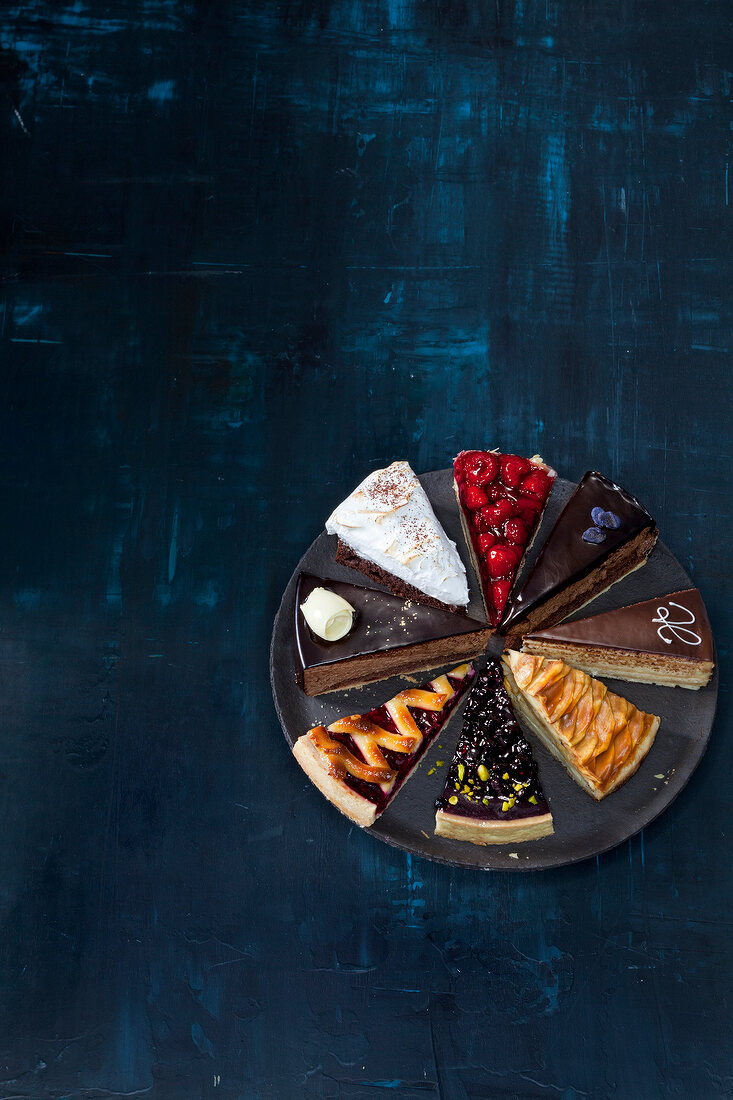 Various slices of cake on a plate