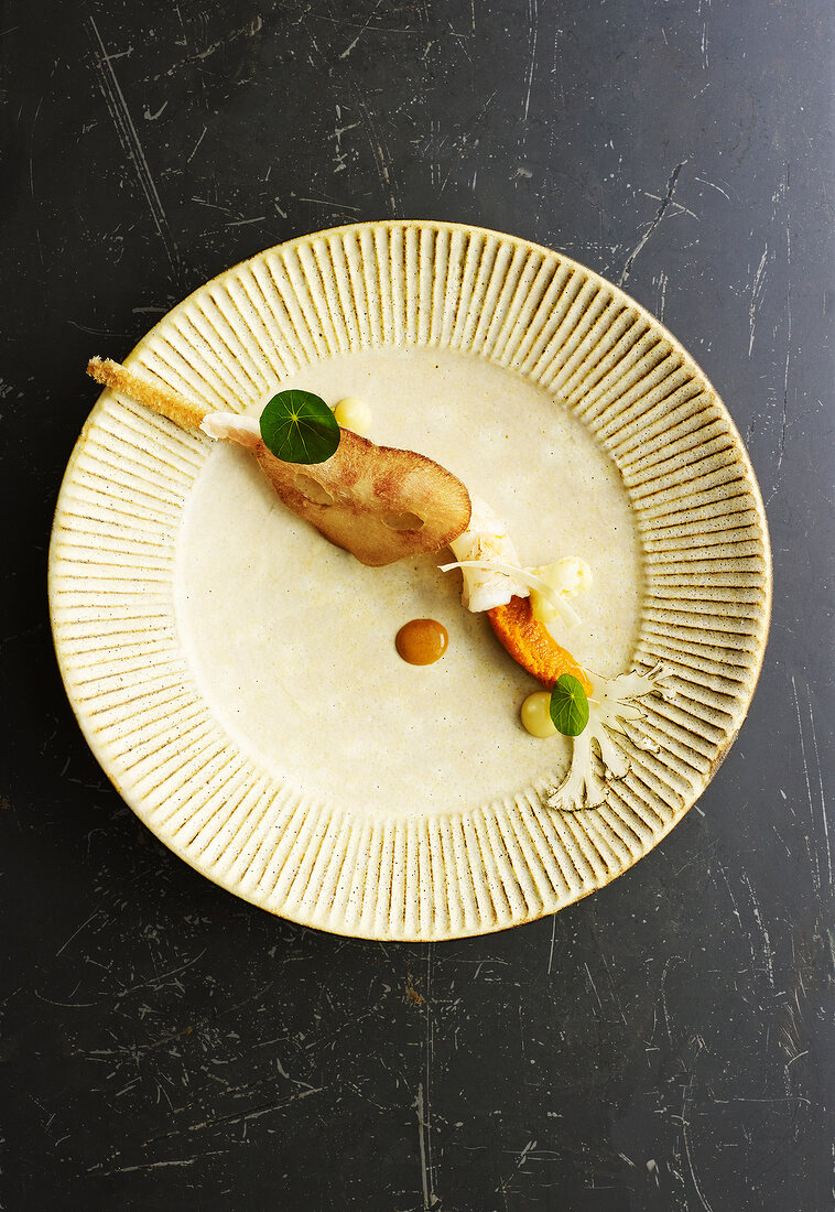 An arrangement of appetisers with langoustine