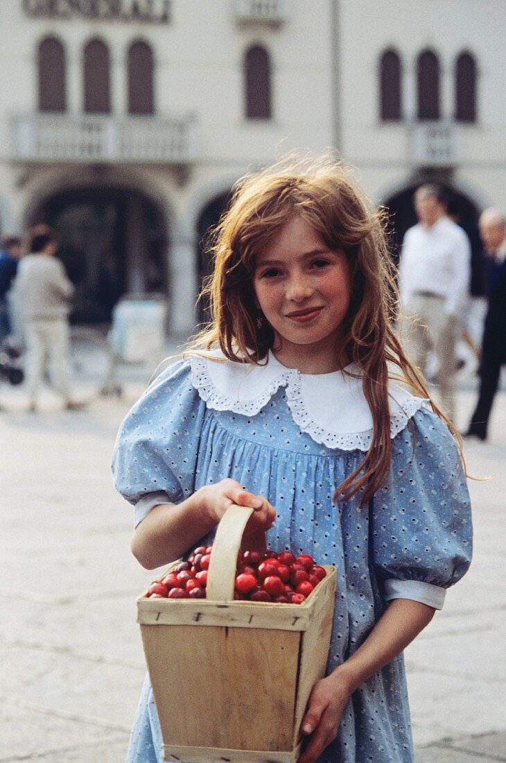 Young Girl with a Basket of Cherries