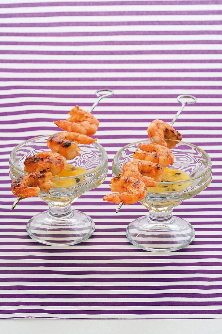 Prawn skewers with passion fruit and ginger dip