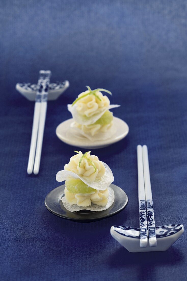 Stacks of rice paper, white chocolate cream and lime