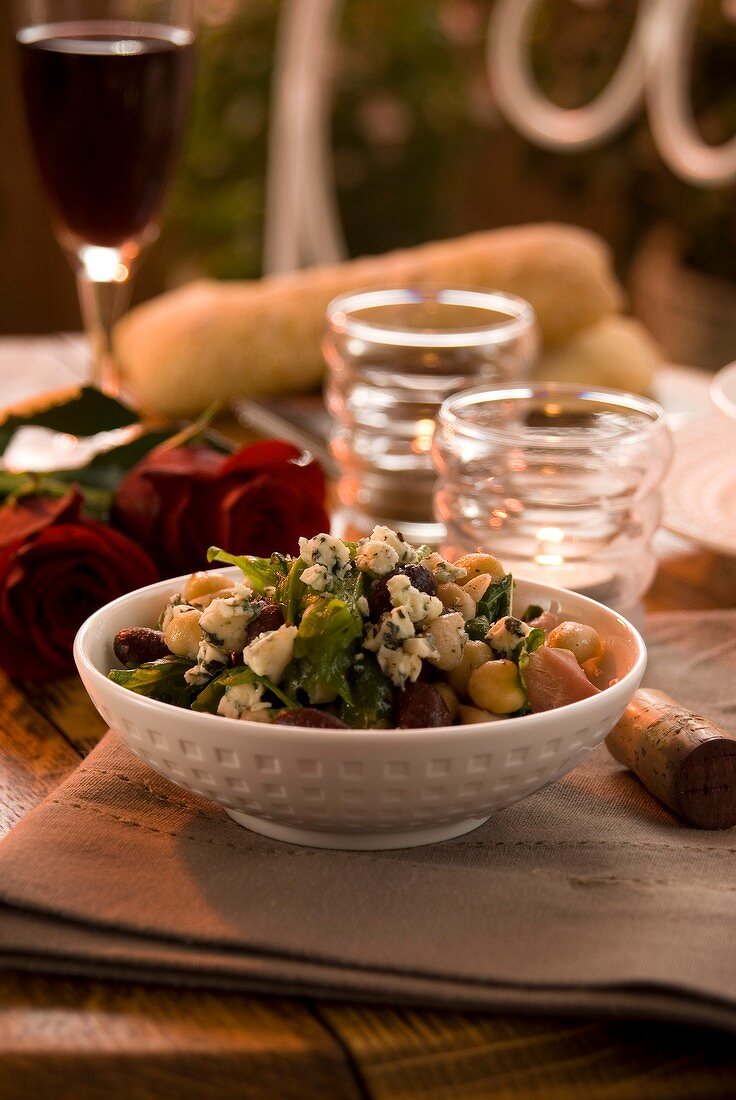 Bean salad with chickpeas, Parma ham and blue cheese