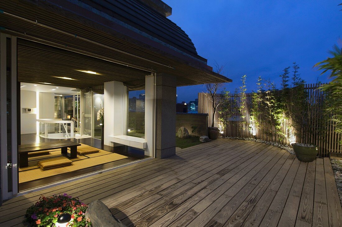 Oriental dining room open to outdoor deck