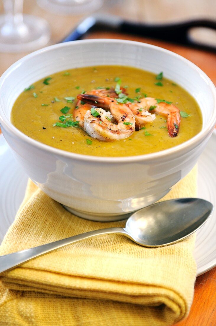 Pumpkin soup with garlic prawns