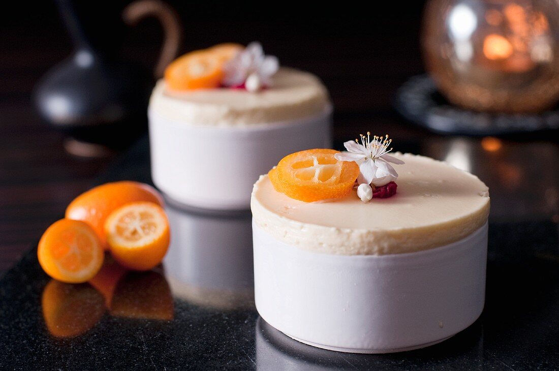 Creamy passion fruit and raspberry mousse with kumquats