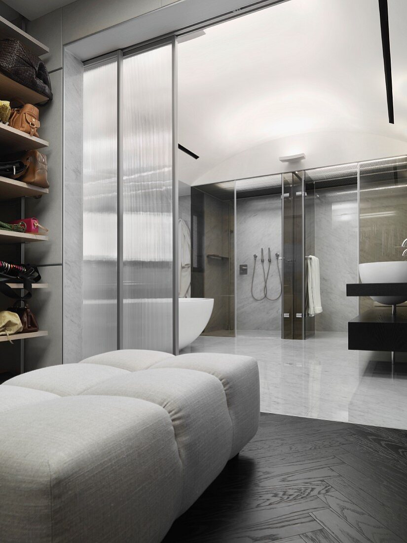 Walk in closet off the side of modern master bathroom