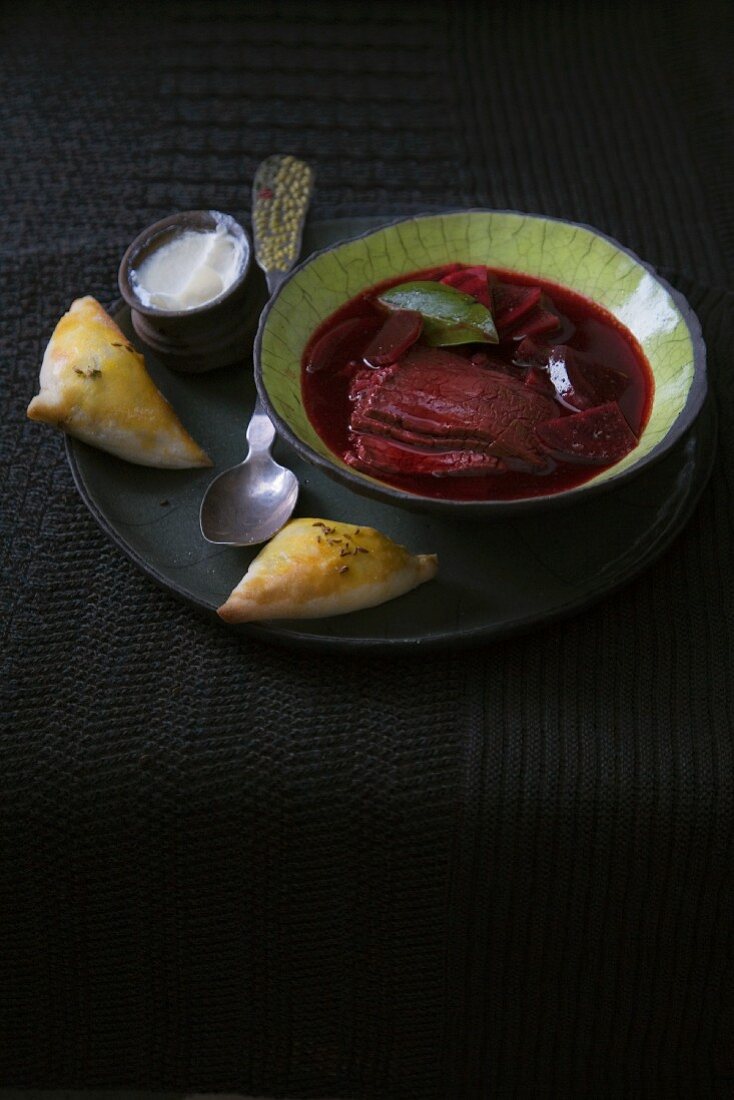 Beetroot soup with samosas