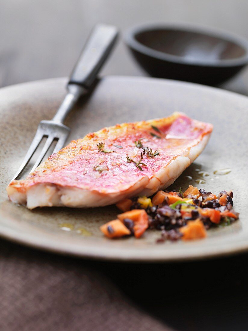 Close up of red mullet with wild rice