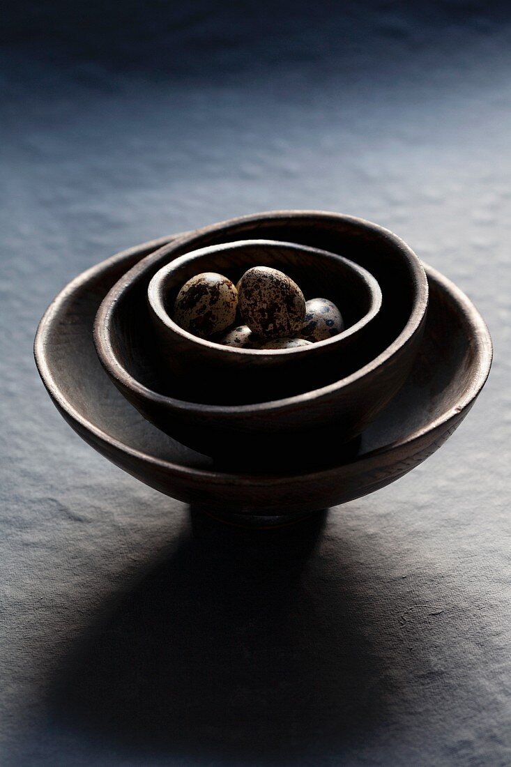 Stacked bowls of quail eggs