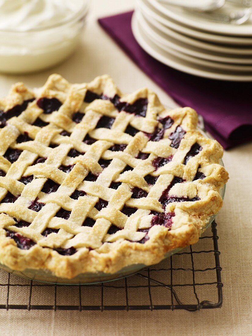 Berry Pie with Lattice Crust on a Cooling Rack