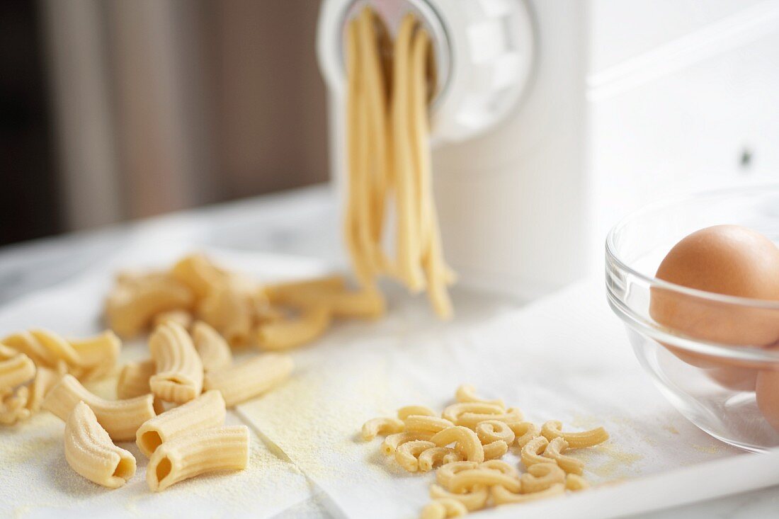 Fresh Homemade Pasta in and around a Pasta Maker