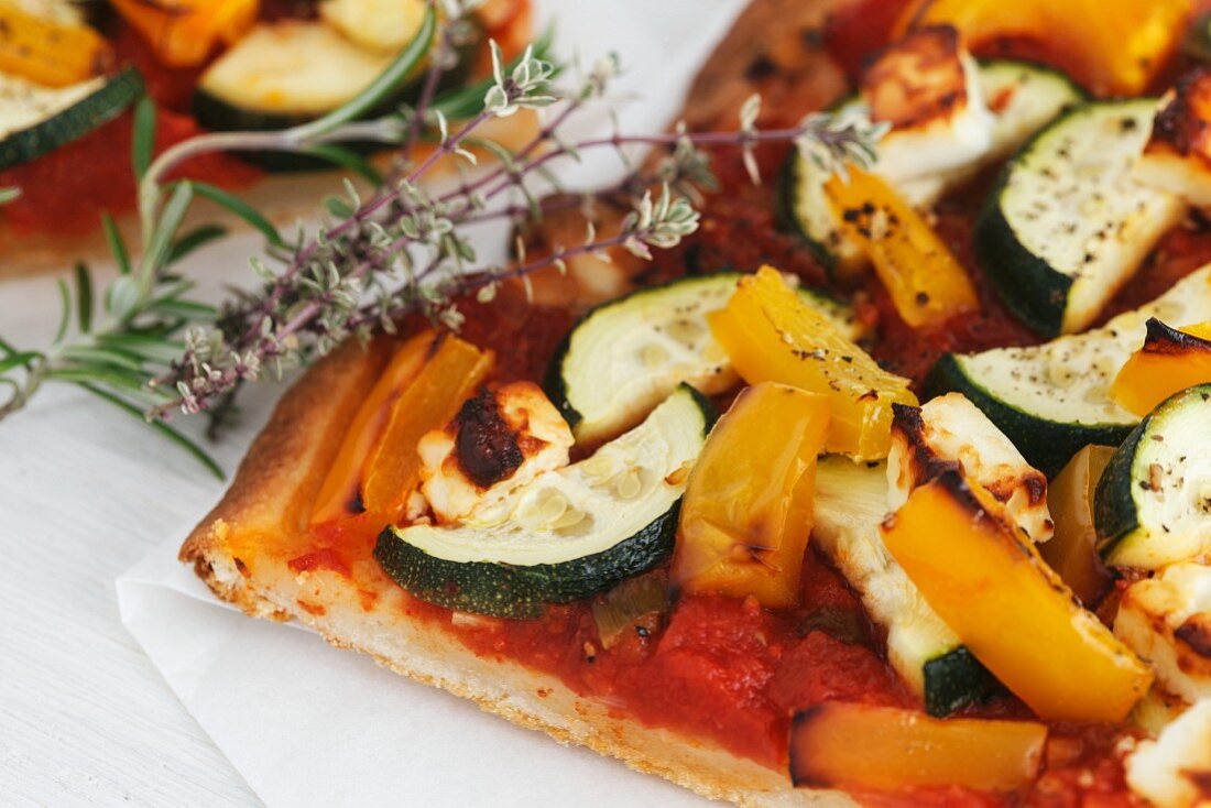 Courgette, tomato, pepper and sheep's cheese pizza