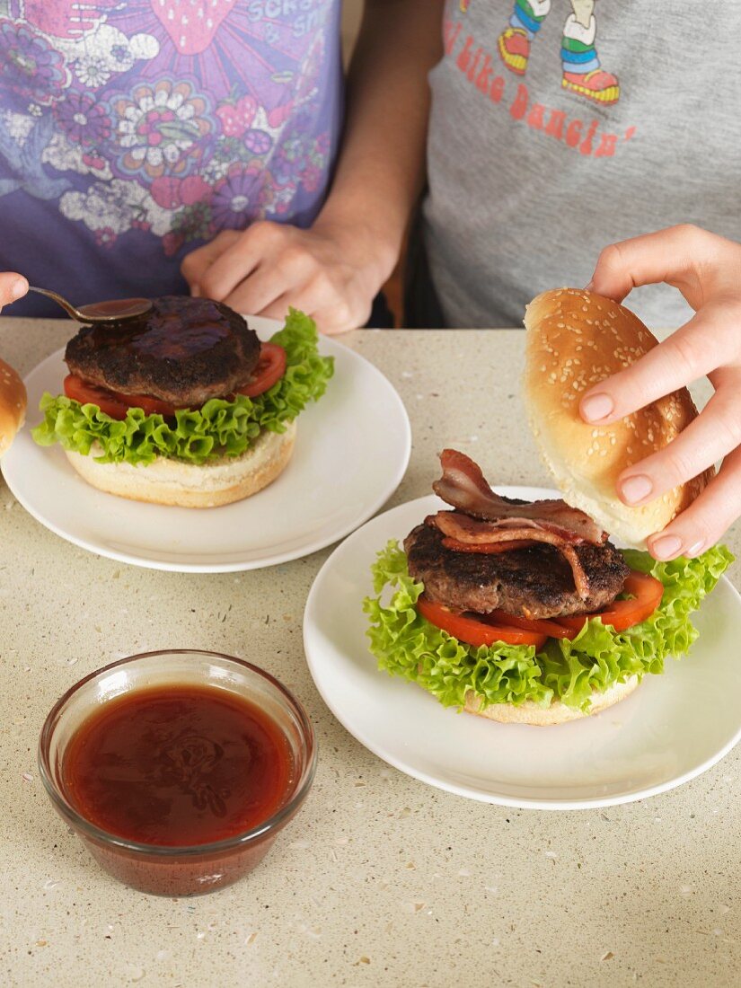 Children building hamburgers