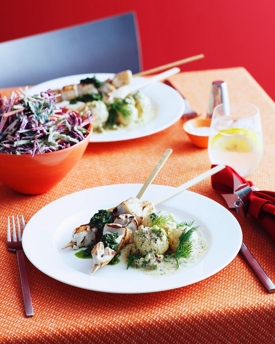 Plate of skewers with coleslaw