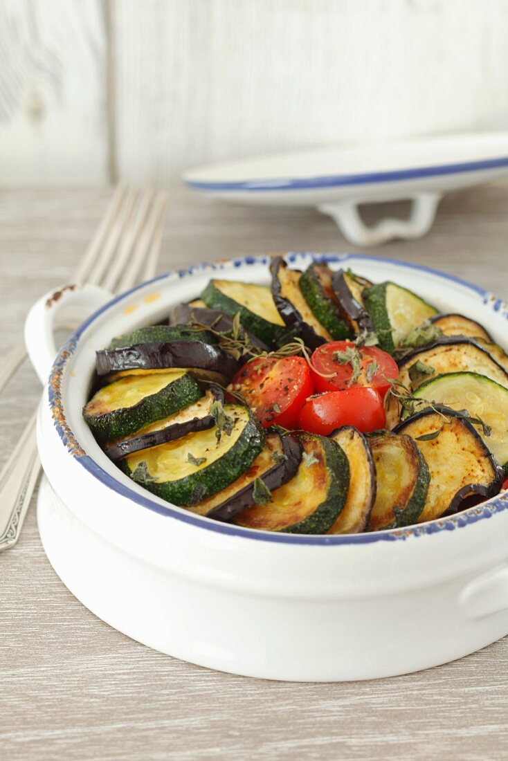 Aubergine bake with courgettes and tomatoes