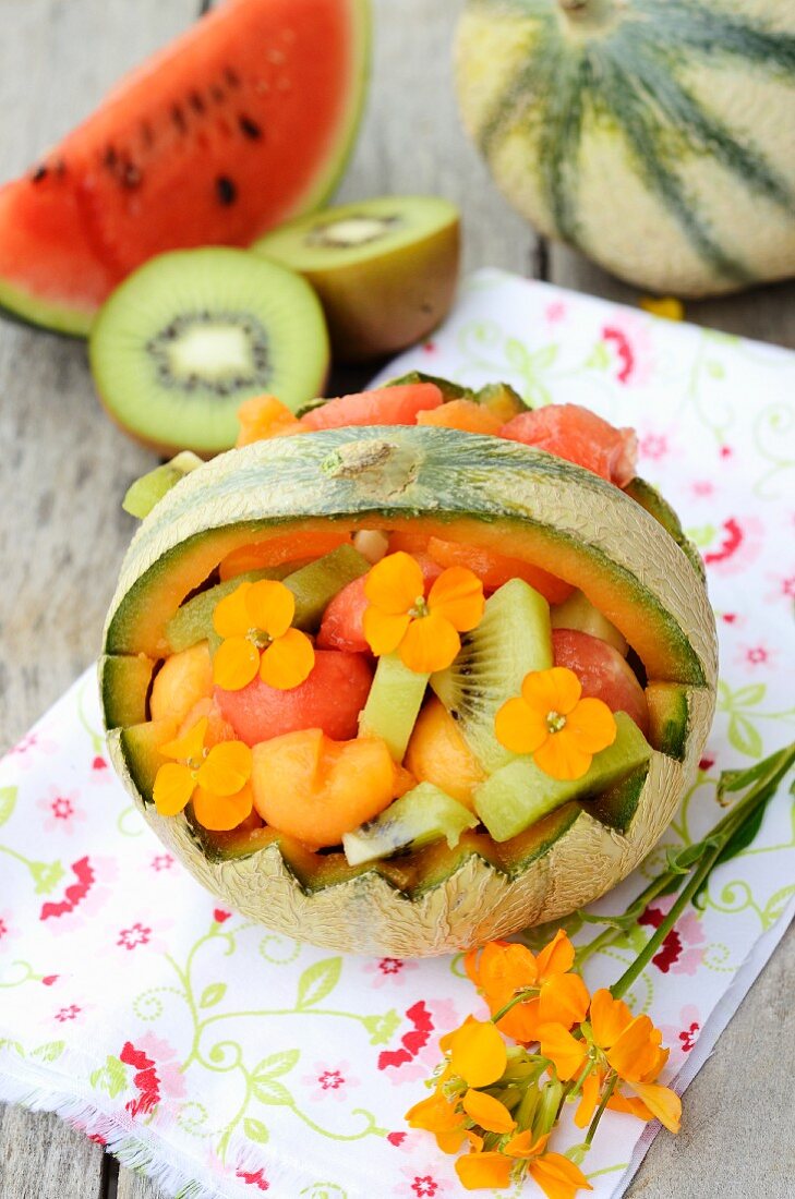 Melon filled with fruit salad