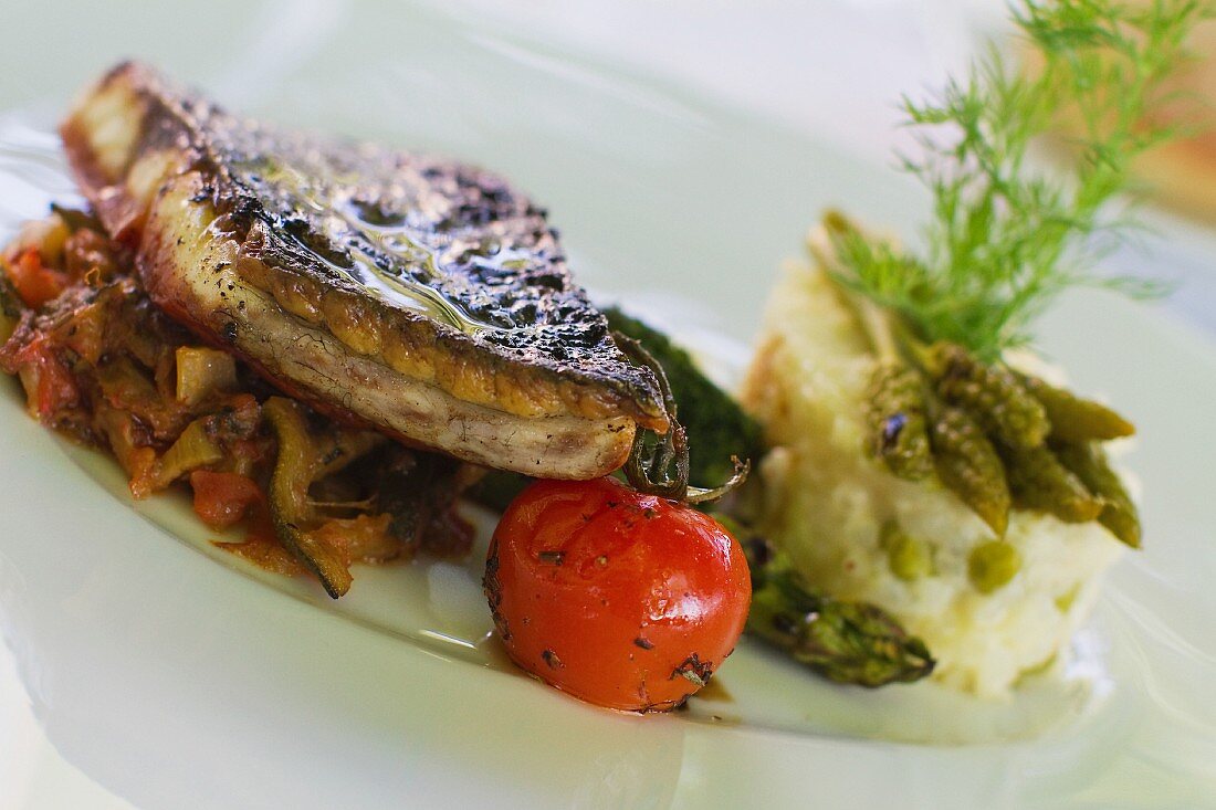 Fish fillet with vegetables and risotto