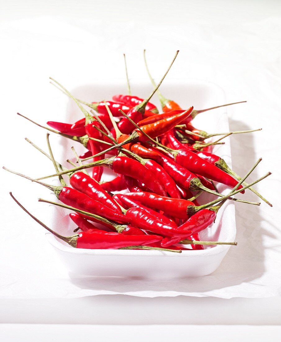 Fresh red chilli peppers in a bowl