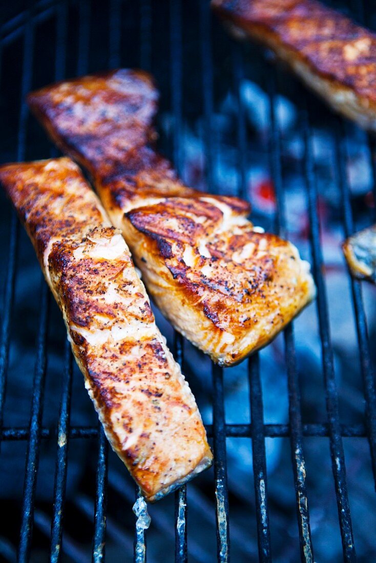 Grilled salmon steaks on a grill