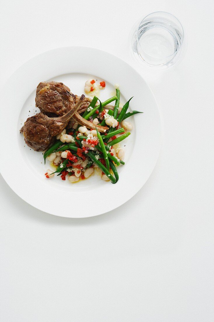 Plate of lamb cutlets and green beans